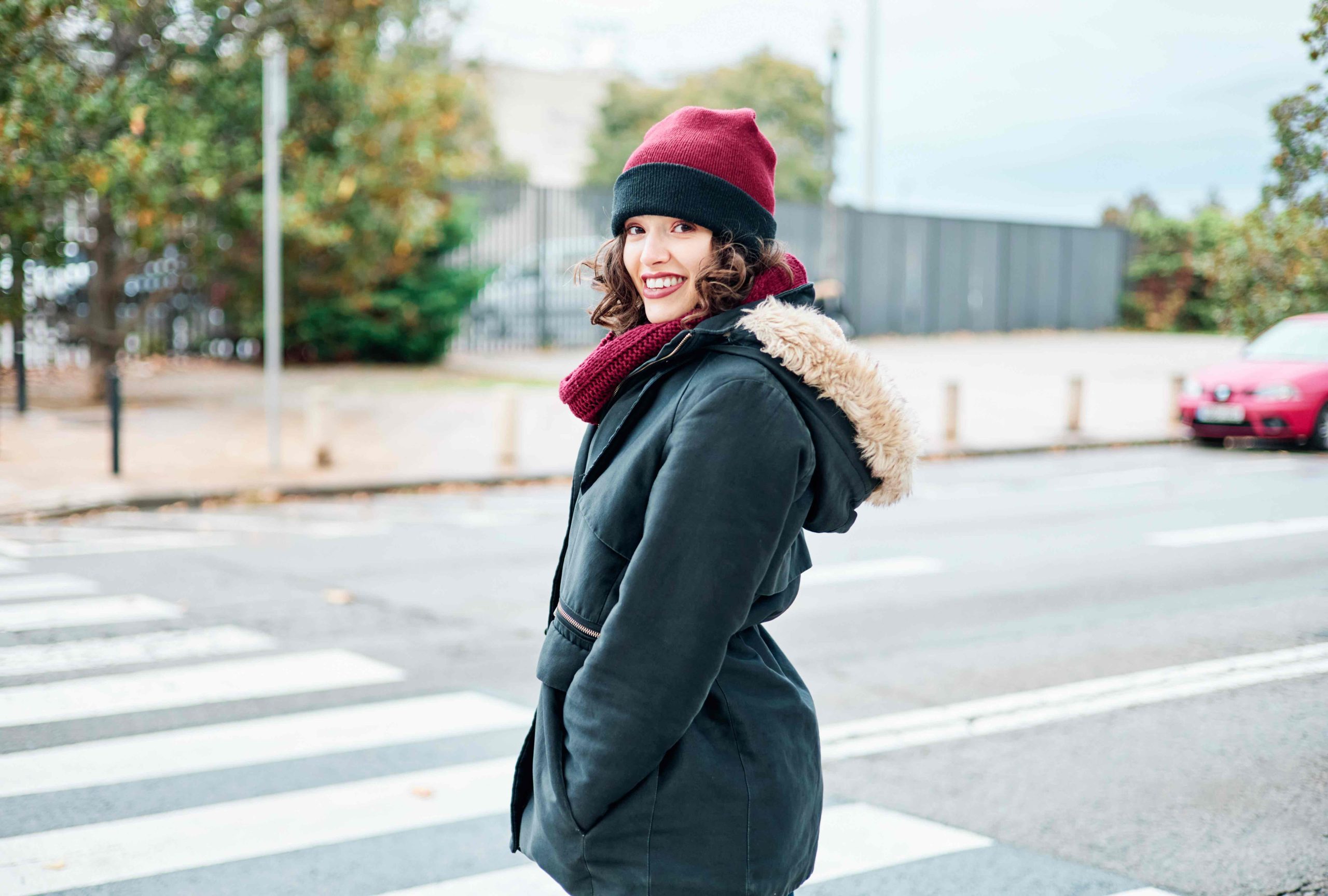 Woman wearing layers of winter clothes to keep warm while out and about